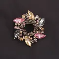 Elegant vintage floral wreath brooch pin with multi-colored crystals on dark fabric. - Antique Gold Multicolor Rose Wreath (C3-6-7983) / 5.5cm (2.17inch)