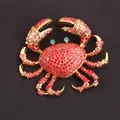 Exquisite gold-plated marine crab brooch encrusted with sparkling red rhinestones. - Full Red Rhinestone Gold Crab