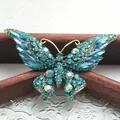 Elegante vintage vlinderbroche met blauwe kristallen en turquoise strass voor dames. - Donkerblauwe Vlinder Stijl