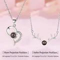 Elegant heart and deer antler projection necklace with 100 languages I love you text stone - Heart and Antler Style (Simple Packaging)