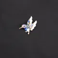 Elegante geëmailleerde kolibrie broche met fonkelende blauwe strassteentjes erop - Blauw en Wit Gradiënt Emaille Ingelegde