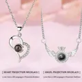Elegant silver projection necklaces with heart and angel wing designs in 100 languages - Heart and Angel Wing Style (Simple Packaging)