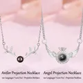 Elegant projection necklace featuring deer antlers and angel wings I Love You designs - Antler and Angel Wing Style (Simple Packaging)
