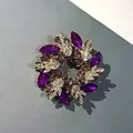 Elegant purple crystal wreath brooch in gold-tone metal, perfect jewelry accessory. - Gold & Purple Wreath (B2-6-5184) / 5.5cm (2.17inch)