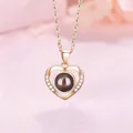 Elegante hartvormige projectieketting in roségoud met 100 talen Ik hou van jou tekst - Eenvoudige Hart Projectie Halsketting / Geschenkdoos