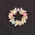 Elegant gold-tone wreath brooch featuring colorful rhinestones and crystal butterflies - Round Wreath Butterfly Style (E5-4-9354) / Multicolor