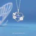 Zilveren harthanger ketting met blauwe steen en details van bloemen en vlinders - Hartenvreugde / Eenvoudige Verpakking