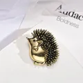 Spilla a forma di riccio in oro vintage con spine nere per abiti - Riccio Dorato (b3-2-5922) / Oro & Nero
