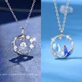 Elegante zeemeerminstaart en koi vis hangers in zilver met een blauwe maansteen accent - Koi + Vis met Jou