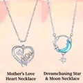 Zilverkleurige hart- en ster-maanhalskettingen met blauw kristal en strass. - Hart van het moederschap en droom van ster en maan / Eenvoudige Verpakking