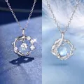 Elegante zilveren vogel- en bladketting met een lichtblauwe edelsteen hanger - Geluks Koi & Blauwe Eucalyptus / 2 Stuks (Eenvoudige Verpakking) / Zilver