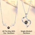 Elegant projection necklaces with reindeer antlers and heart pendants for romantic gifts - Antler and Heart Projection / Simple Packaging