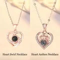 Elegant rose gold heart projection necklaces with swirl and antler design details - Heart Swirl and Heart Antler Set / Simple Packaging