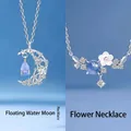 Elegante zilveren kettingset met hemelse maan en delicate bloemvormige hangerontwerpen - Floating water moon + flower wei young / Eenvoudige Verpakking