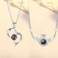 Zilveren projectieketting met hart- en vleugelhangers - Hart aan Hart en Engelenvleugels Set