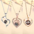 Hart projectie ketting in zilver en roségoud met 100 talen Ik hou van jou luxe - Hart aan Hart, Hartgewei en Eenvoudig Hart Set