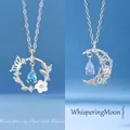 Elegante zilveren ketting met blauwe druppel edelsteen in maan en vlinder ontwerp - Vlinderbloem en drijvende maan / 2 Stuks (Cadeaudoos) / Zilver