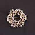 Elegant golden floral wreath brooch featuring sparkling clear and amber rhinestones - Amber Rose Wreath Style (E7-3-9536) / Gold