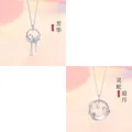 Detailed view of moonstone necklaces with floral tassel and snake moon motifs - Fanghua & Snake Moon (Style 3) / Two-Piece Set