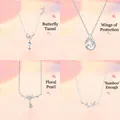 Collection of four elegant silver necklaces with butterfly, wing, floral, and bamboo pendants - Four-Piece Set