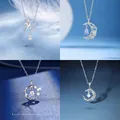 Colliers colombe de la paix et branche d'olivier en argent de quatre styles sur fond bleu - Ensemble Collection 4 Colliers