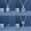 Set of 4 minimalist silver necklaces featuring heart, bamboo, and bird designs - Four-Piece Set / Full 4-Necklace Set