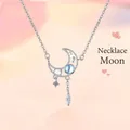 Elegante zilveren halve maan ketting met blauwe edelsteen en sterrenhangers voor dames - Maan