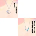 Elegante zilveren maan en vlinder hanger ketting met fonkelende blauwe kristallen - Ketting Set (Set 3) / Set van 2