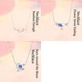 Set of 3 delicate silver-tone necklaces with bamboo, floral, and celestial charms. - 3-Piece Necklace Set 5 / Set of 3