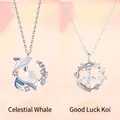 Unieke zilveren kettingvarianten met walvisparel en fonkelende kristallen hangers - Walvisval en Geluks-Koi Set