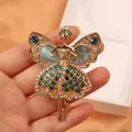 Prachtige vintage feeënbroche met blauwgroene kristallen en iriserende steentjes. - Pauwblauwe Vintage Fee (SMT1005005925508747)