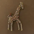 Macro view of vintage giraffe brooch featuring amber and clear crystals on brown background - Giraffe Shape (Style 1)