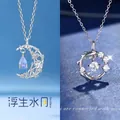 Zilveren halskettingen set met halve maan en koi hangers en blauwe druppelsteen - Zwevende Maan & Geluks Koi / 2 Stuks (Cadeaudoos) / Zilver