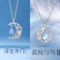 Elegante zilveren vogel- en maankettingset met blauwe en paarse edelstenen - Zwevende Maan & Blauwe Eucalyptus / 2 Stuks (Cadeaudoos) / Zilver
