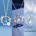 Zilveren kettingen met blauwe edelstenen en vlinder-, veer- en takmotieven in drie varianten - Vlinder & Koi & Eucalyptus / 3 Stuks (Cadeaudoos) / Zilver
