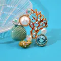 Geëmailleerde broche in oceaanthema met schelpen, koraal en parels in goud - Multicolor Emaille Zeeleven Combo (a9-3-5744)