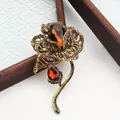 Vintage luxe kristallen bloem broche met amberkleurige druppelstenen in antiek goud - Amberkleurige Bloemenstijl (风格30)
