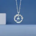 Elegante zilveren ketting met ronde veerhanger en een glinsterende iriserende kraal - Met Jou Veer (Cadeaubonset)
