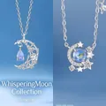 Elegante zilveren ster en maan hanger ketting met iriserende blauwe kristallen - Zwevende Maan en Sterren Rond de Maan / Geschenkdoos
