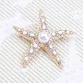 Elegante goudkleurige zeester broche met parel en fonkelende witte steentjes voor kleding. - Kunstparel en Strass Zeester (2-3824) / Zoals afgebeeld