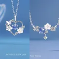 Elegante zilveren bloemen- en harthanger met blauwe sterrensteen sieraden voor dames - Hart in Bloei + Bloemen Verwelken Nooit / Geschenkdoos