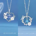 Elegante zilveren ketting met bloemenhart hanger en lichtblauwe edelsteen - Hart in Bloei + Vlinder en Bloem / Geschenkdoos