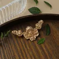 Elegant vintage baroque cherub angel brooch with matte gold finish for women's fashion - Angel Relief Style