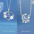 Elegante sterling zilveren kettingen met hart-, ster- en maanvormige hangers in blauw - Hart in Bloei + Sterren Rond de Maan / Geschenkdoos
