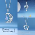 Dromerige zilveren halve maan hanger ketting met kristallen druppel en fonkelende sterdetails - Zwevende Maan + Dromerig Sterrenstelsel + Vlinder en Bloem / Geschenkdoos