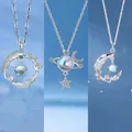 Elegantes silbernes Halskettenset mit Himmelsmotiven wie Mond Stern und Planeten - Feder Aurora und Mondzweig Stil / 3er-Set