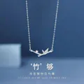 Minimalist silver bamboo pendant necklace with sparkling zircon accents for women. - Bamboo Joint / Silver