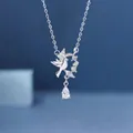 Elegant silver bird pendant necklace featuring a sparkling floral wreath and pear stone - Eucalyptus and Bird / Silver