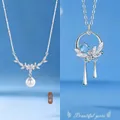 Elegant floral silver pendant necklace with pearl and blue gemstone details for women - Floral Cluster & Youthful Elegance (Set of 2)