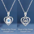 Elegant heart pendant necklaces featuring blue and clear shimmering stones in silver - Two-Piece Set / Ocean Heart Blue and White Set